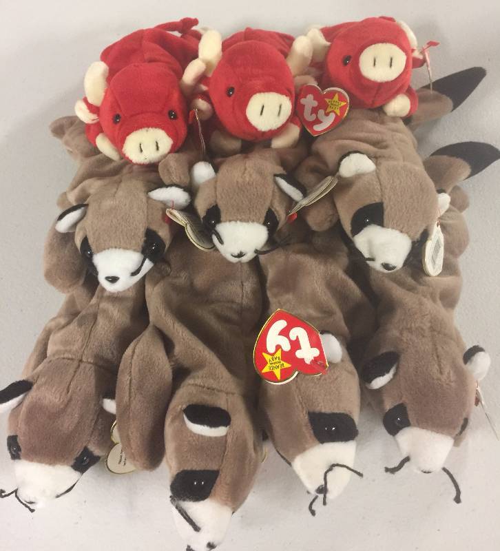 lot 1114 image: TEN Original Ty Beanie Babies Ringo the Raccoon x7 Snort the Bull x3