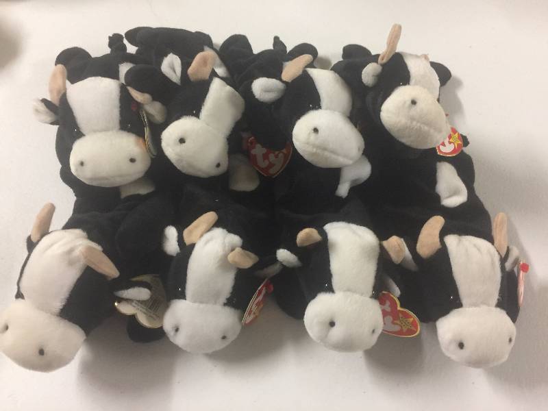 lot 1145 image: EIGHT Original Ty Beanie Babies Daisy the Cow x8