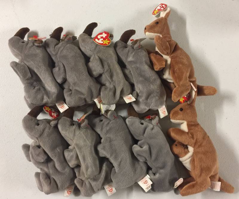 lot 1163 image: TEN Original Ty Beanie Babies Pouch the Kangaroo x2 Spike the Rhinosaurus x8
