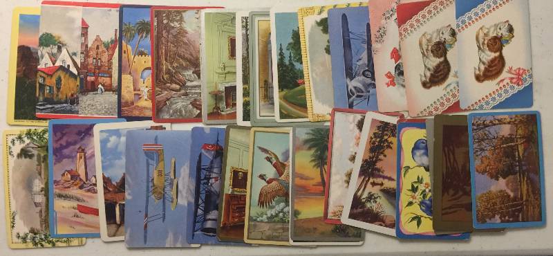 lot 1049 image: 32 Original 1940s and 1950s Swap & Playing Cards with Various Images (Planes, Flowers, Cats, much more)