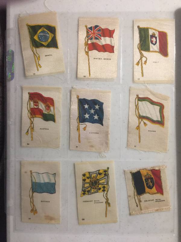 lot 1057 image: NINE Original 1900-1910s Tobacco Country Flag Silks including Italy, Austria, Brazil, Persia, and more