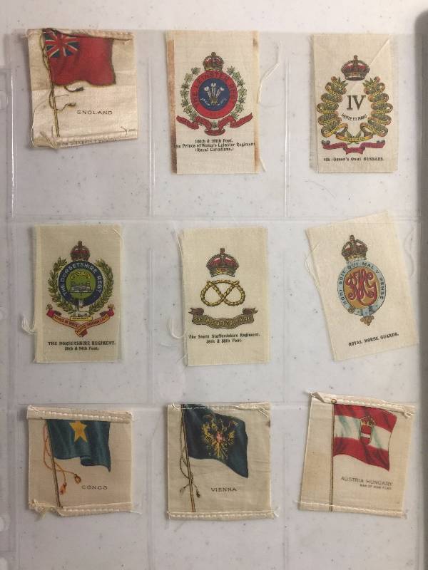 lot 1063 image: NINE Original 1900-1910s Tobacco Country Flag Silks including England, Congo, Austria-Hungary, and more