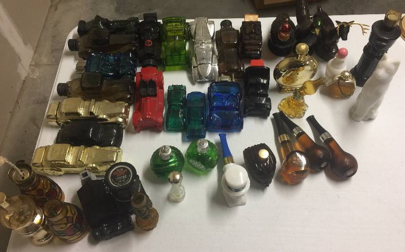 lot 1209 image: 40 FORTY Vintage PerfumeColon Avon Bottles