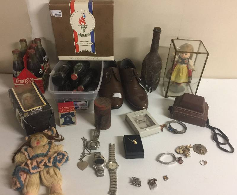 lot 1212 image: Huge Lot of Knick Knacks Liberty Bell, Jewelry, Watches, Olympics, Coke Bottles & More You Get All Pictured