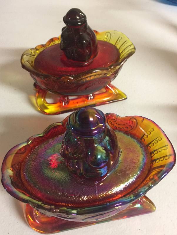lot 1223 image: Two Five Inch Santa Claus Sled Candy Dishes Carnival Glass No Chips or Cracks