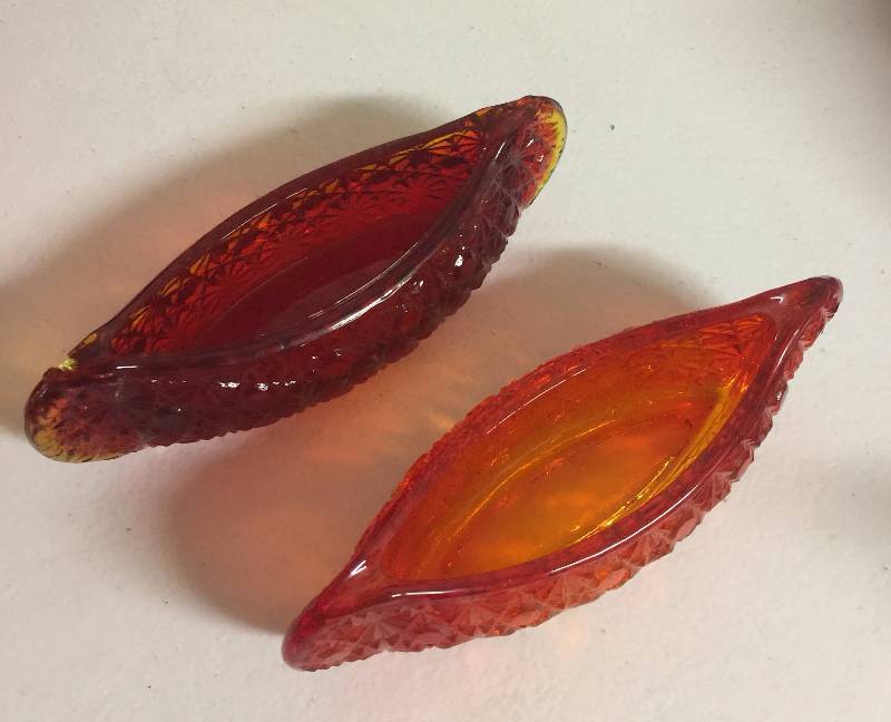 lot 1230 image: Two Amber Colored Five Inch Long Canoe Carnival Glass Boats