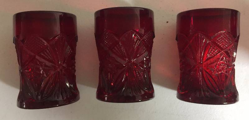 lot 1243 image: Three Small Deep Ruby Red 4 Inch Drinking Glasses