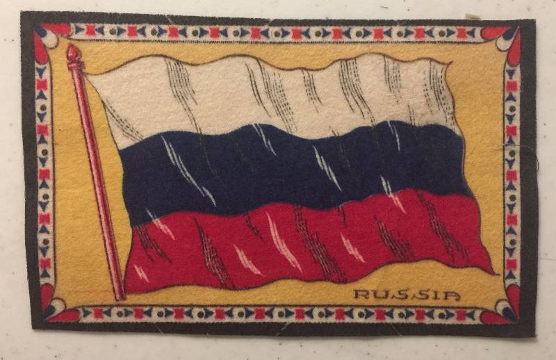 lot 813 image: Original 1910 Russian Flag Felt Blanket Tobacco or Cigar Insert 4x6 inches Over 100 Years Old