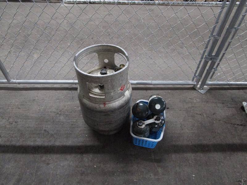 lot 665 image: TankPropane Cannister Lot