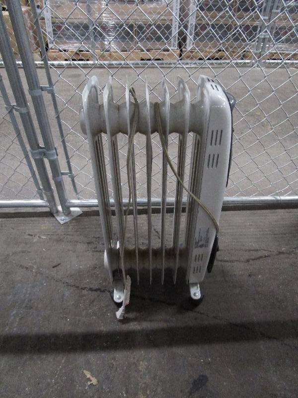 lot 666 image: Electric Heater