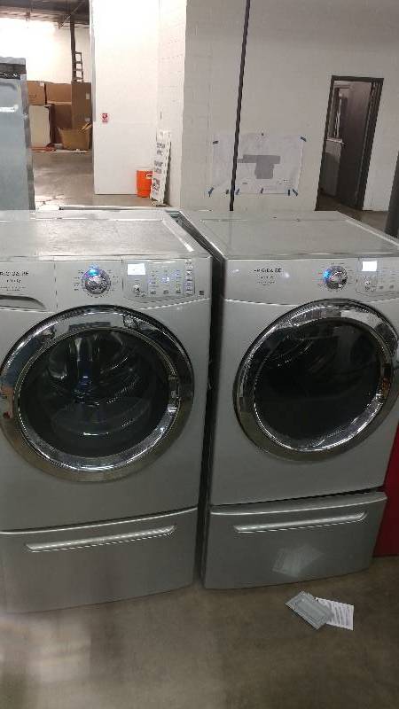 lot 1003 image: Frigidaire Silver Household Frontload Washer Dryer Set
