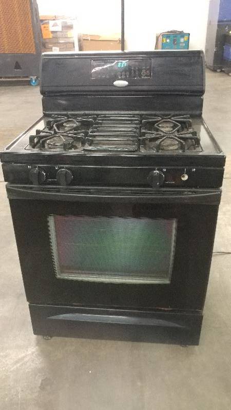 lot 1011 image: Whirlpool Gas 4 Burner Household Stove