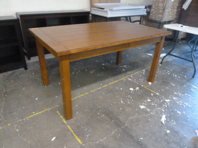 lot 8 image: LARGE WOODEN DINING TABLE - HAS A DENT ON ONE SIDE