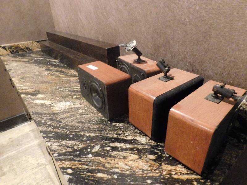lot 86 image: Lot of Wall Mount Speakers and Wood Display Rack