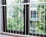 (1) pair window guards W082, adjustable, each panel measures 30