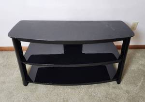 lot 115 image: Insignia High Gloss Black Metal and Glass Entertainment Stand 43x17.5x21