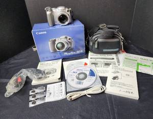 lot 125 image: Canon Power Shot S2 15 with Case and Accessories