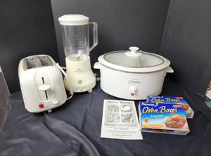 lot 233 image: Toaster, Westbend Crockpot, and Blender