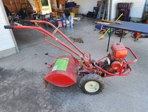 lot 338 image: Troy Bilt Hors Garden Tiller 7HP Kohler Engine (Has Compression) needs air in tires