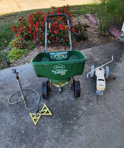 lot 344 image: Scotts Turf Builder, Rain Train (Like New), and Sprinklers