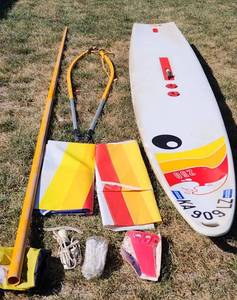 lot 403 image: Bic marines 250 Sailboard (150 Long), Mast, (2) Sails, Boom, and other Accessories