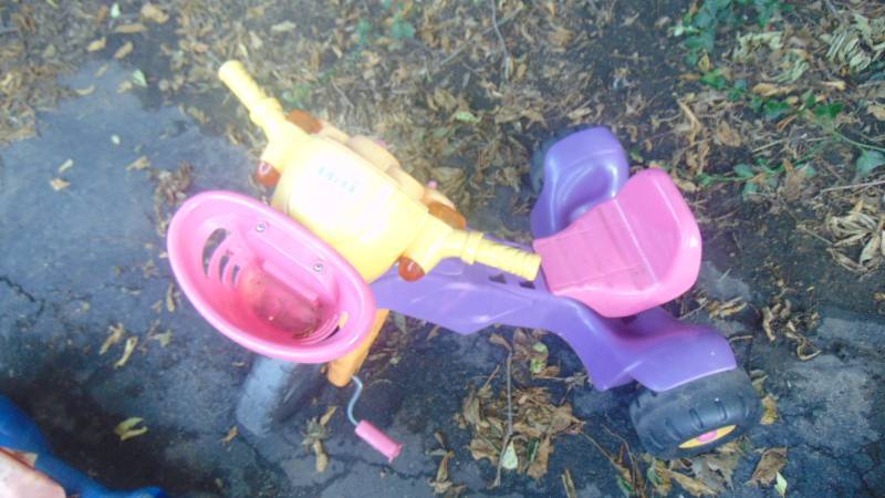 lot 480 image: purple pink and yellow big wheel