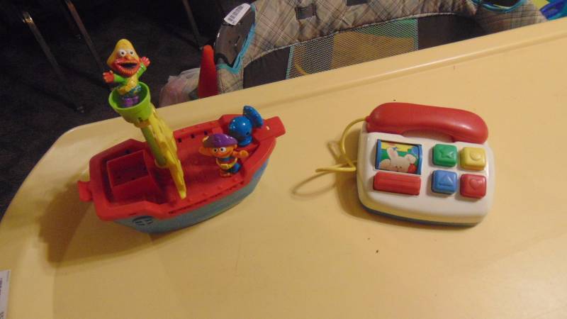 lot 518 image: Sesame Street pirate ship and toy phone