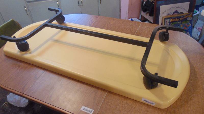 lot 577 image: Angels Rest hard cover and rolling cart