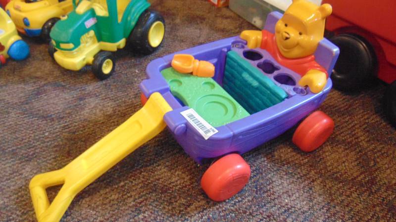 lot 596 image: Pooh pull cart