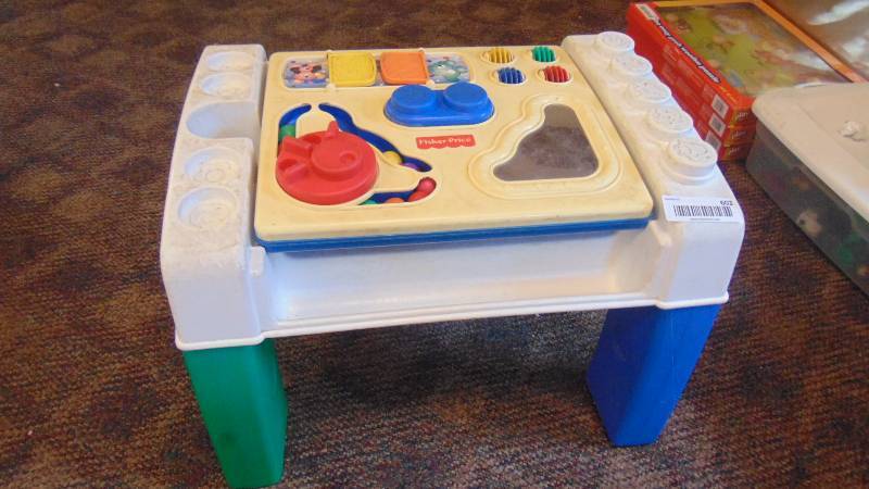 lot 602 image: Fisher Price play table and accessorizes