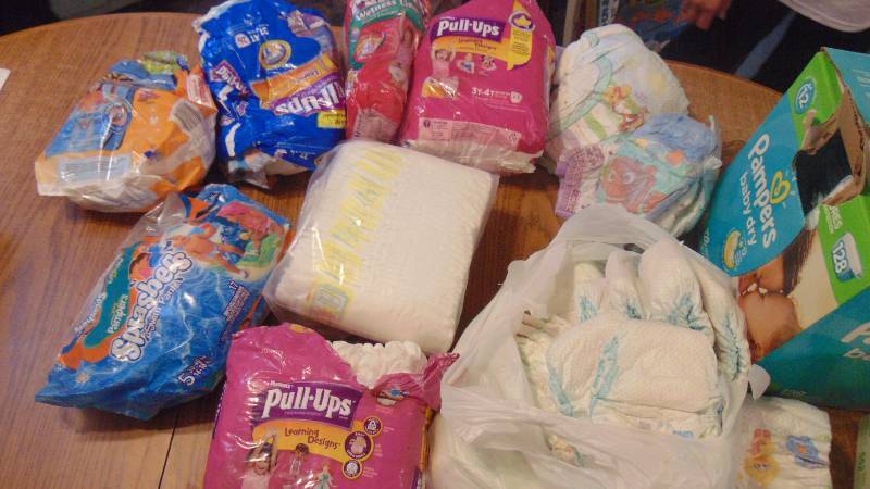lot 610 image: huge lot of multiple sizes of diapers