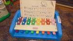 little tikes -piano/xylophone w/ sheet music - from the 80s