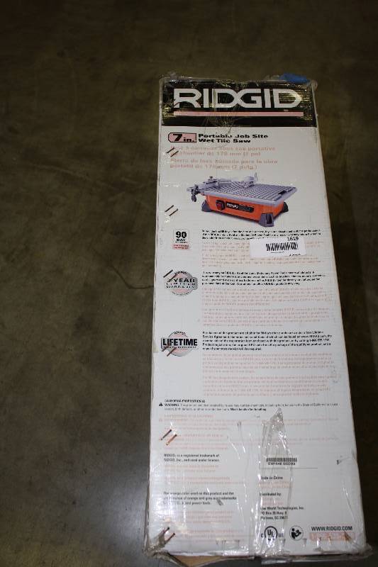 lot 1619 image: Ridgid 7 inch Wet Tile Saw