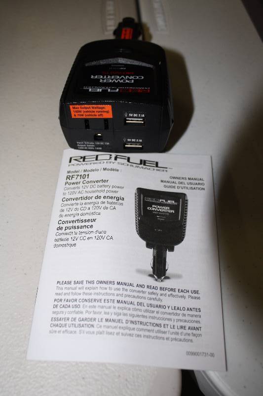 lot 1528 image: Red Fuel Powered by Schumacher 140-Watt Dual USB Port with 120-Volt AC Household Power