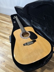 lot 19922 image: Esteban Steel String Acoustic Guitar with Case and Accessories