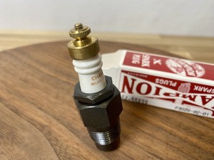 lot 19924 image: Champion Brass Top Spark Plug