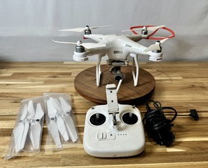 lot 19940 image: DJI Phantom Drone with controller, charger and extra blades