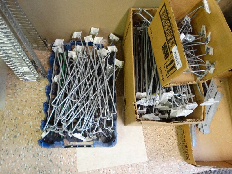 lot 1027 image: 3 boxes of various peg display hooks.