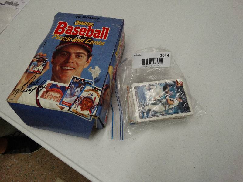 lot 1044 image: 1988 Don Russ baseball cards- 36 unopened packs- additional misc cards.