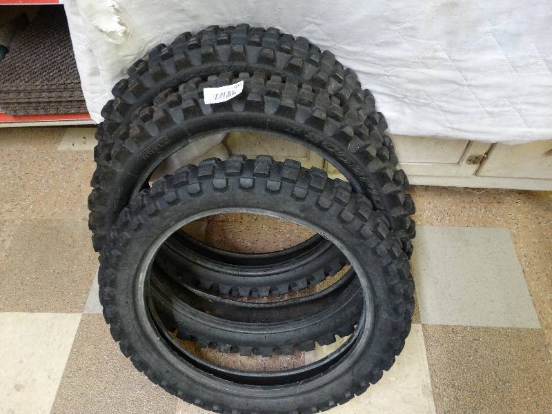 lot 1081 image: 3 used knobby dirt bike tires.