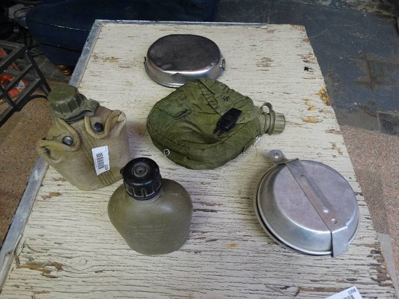 lot 1119 image: Army surplus mess kits and canteens.