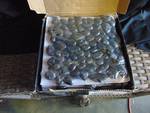 (1) box polished black pebbles meshed 12