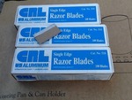 Four boxes of 100 single edge razor blades