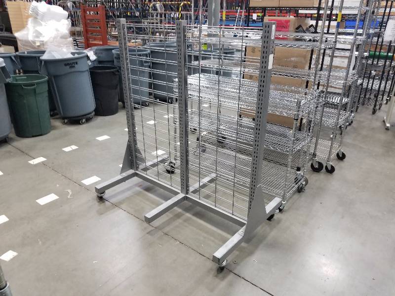 lot 1596 image: Rolling display rack with wire back
