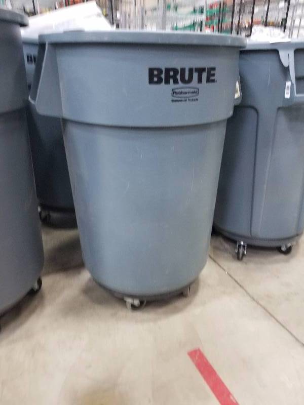 lot 1644 image: Brute by Rubbermaid Trash Can with Roller base