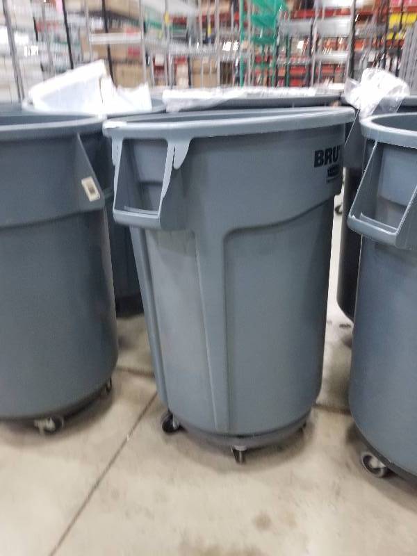 lot 1645 image: Brute by Rubbermaid Trash Can with Roller base