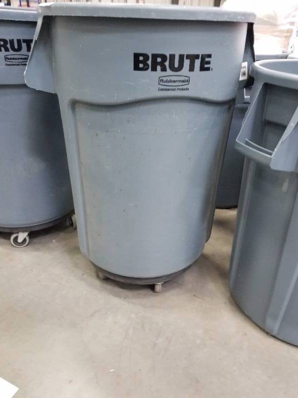lot 1638 image: Brute by Rubbermaid Trash Can with Roller base