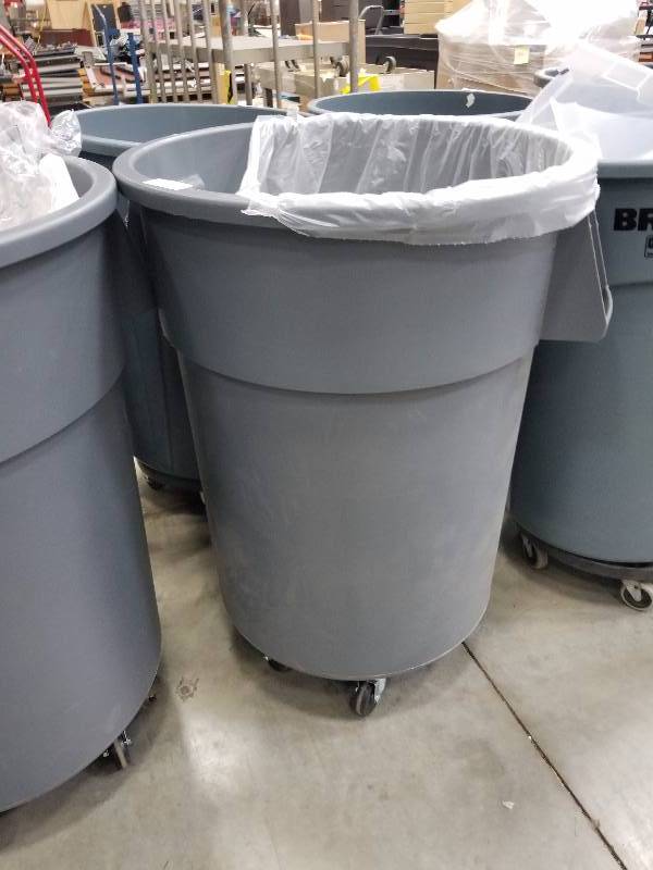lot 1642 image: Brute by Rubbermaid Trash Can with Roller base