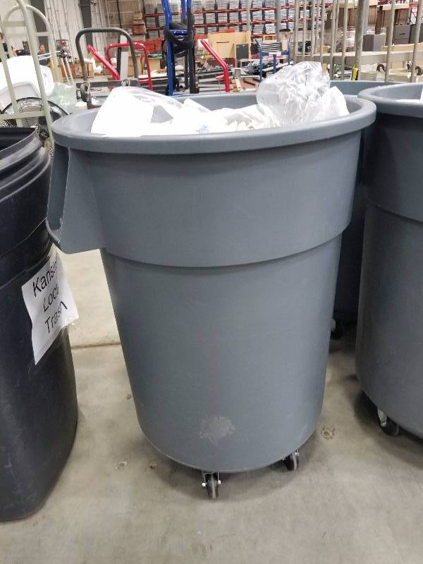 lot 1643 image: Brute by Rubbermaid Trash Can with Roller base