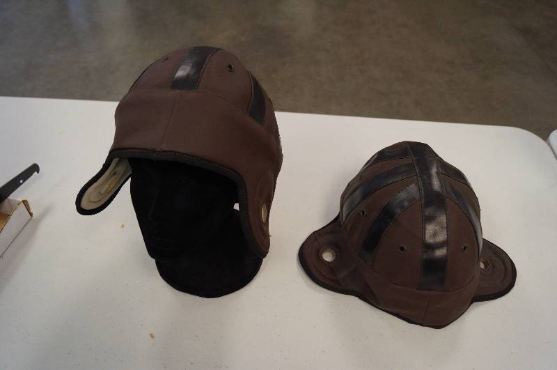 lot 2057 image: Pair of old school looking football helmets
